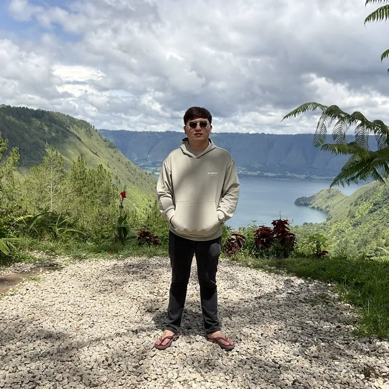 Filbert Henrico — Technical Customer Success Lead at Finetiks, photographed in casual professional attire